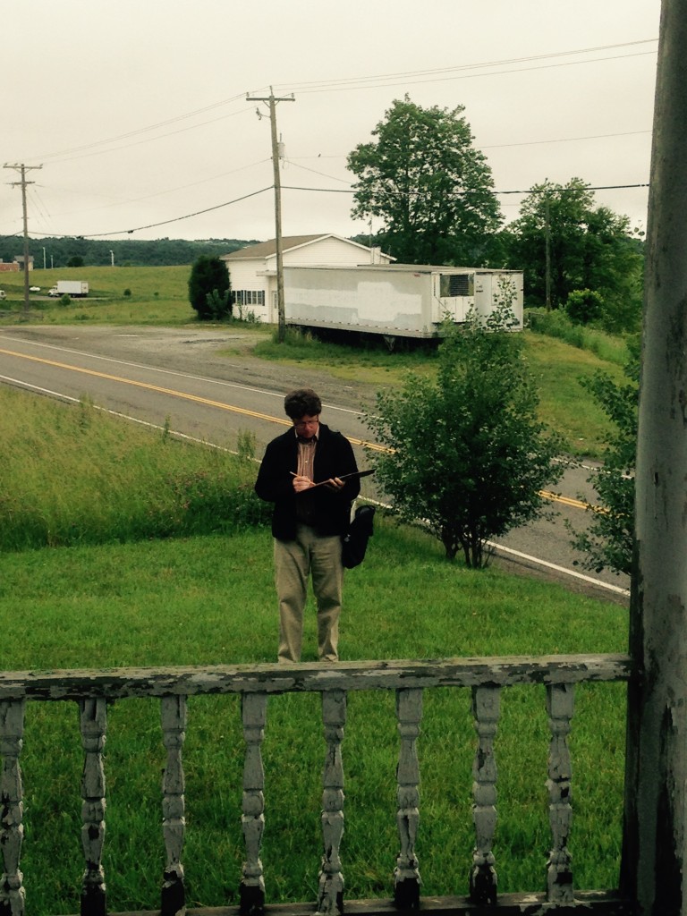 Outside of the J. Sidna Allen home is Hunter Greene, RA ~ Project Manager, Architect